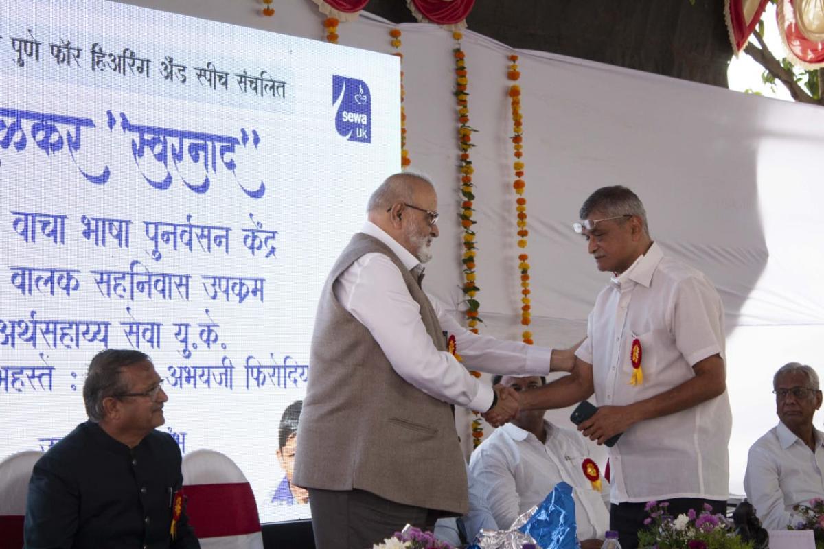 Dr Milind Kirtane with Mr Abhay Firodia, Chairman – Force Motors at the inaugural function of Pusalkar Swaranaad Residential Rehabilitation Centre, Pune.